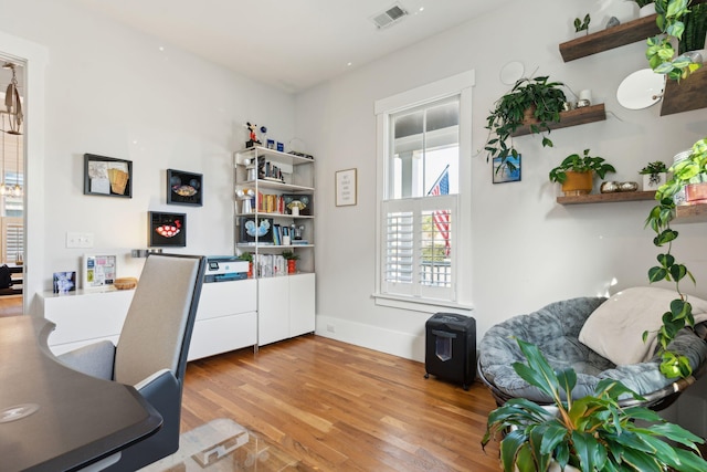 office space featuring light wood-type flooring