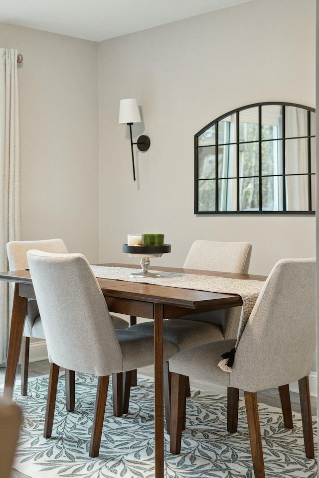 dining room with wood finished floors