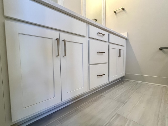 bathroom featuring baseboards