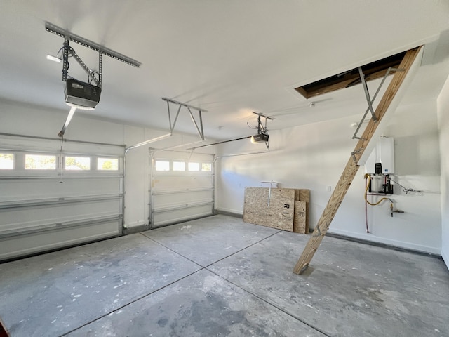 garage with baseboards and a garage door opener