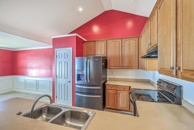 kitchen featuring stainless steel refrigerator with ice dispenser, range with electric stovetop, a sink, under cabinet range hood, and wainscoting
