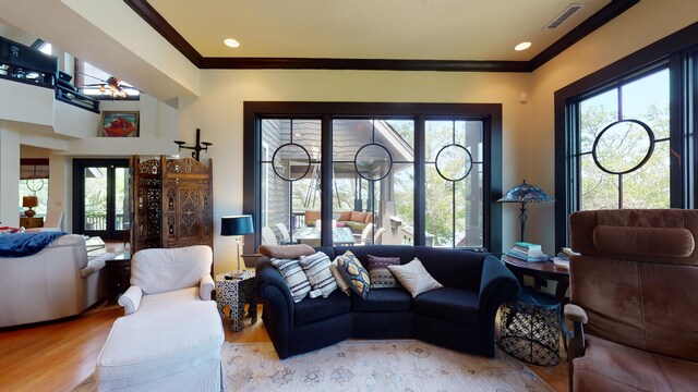 268 Little Oak Island Dr, Folly Beach, SC 29439 - living room with ornamental molding and wood-type flooring