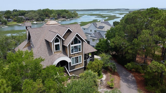 drone / aerial view with a water view