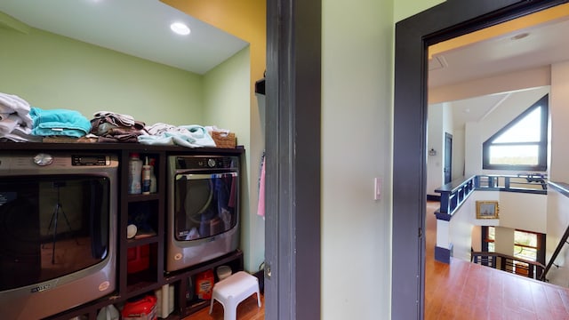 268 Little Oak Island Dr, Folly Beach, SC 29439 - laundry room with washer and clothes dryer and hardwood / wood-style flooring