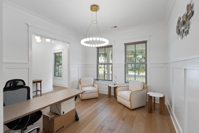 3226 Waverly Ln, Johns Island, SC 29455 - office area featuring light wood-type flooring, a decorative wall, wainscoting, and crown molding