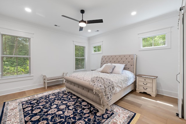 3226 Waverly Ln, Johns Island, SC 29455 - bedroom with light wood-style flooring, crown molding, recessed lighting, and a ceiling fan