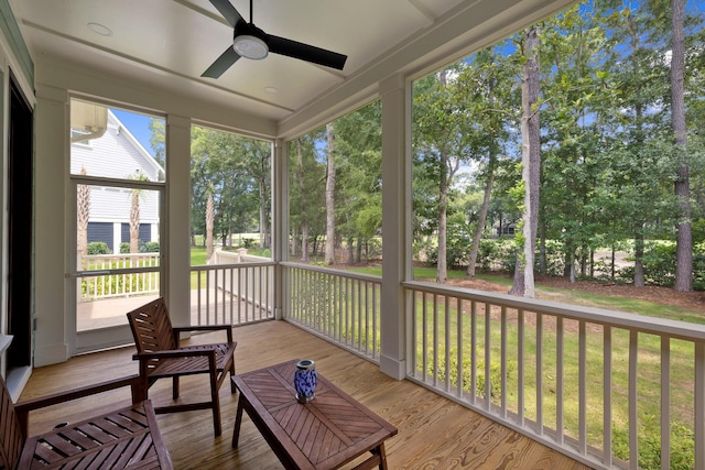 3226 Waverly Ln, Johns Island, SC 29455 - sunroom with a ceiling fan and view of wooded area