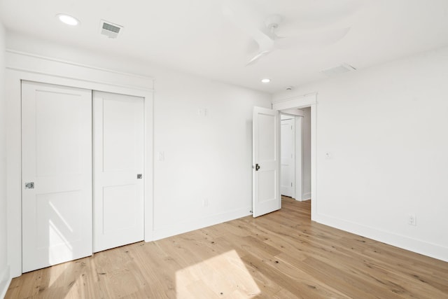 313 E Arctic Ave, Folly Beach, SC 29439 - unfurnished bedroom with baseboards, light wood finished floors, recessed lighting, a closet, and ceiling fan