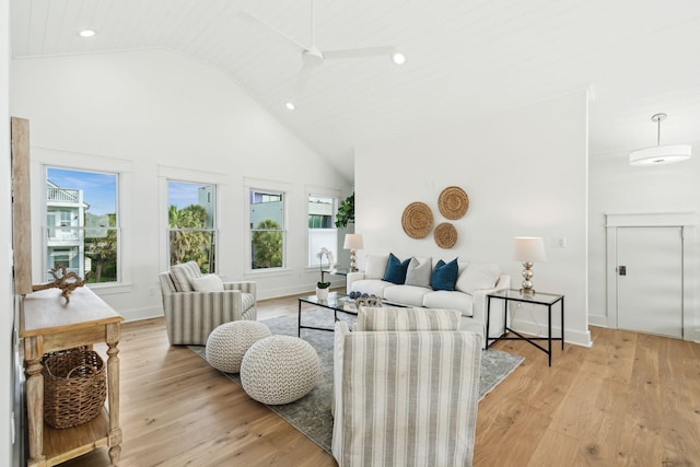 313 E Arctic Ave, Folly Beach, SC 29439 - living room featuring high vaulted ceiling, light wood-style flooring, recessed lighting, and baseboards