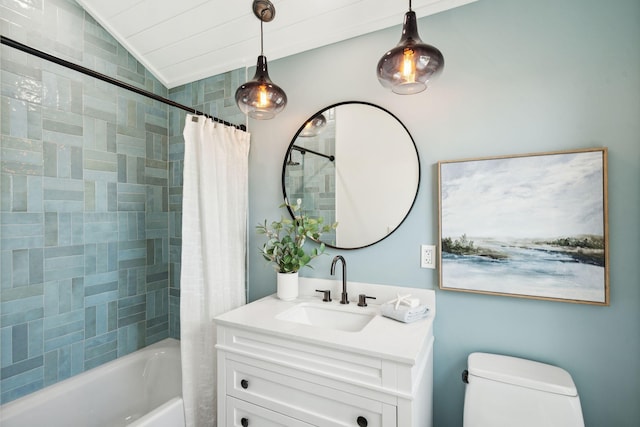 313 E Arctic Ave, Folly Beach, SC 29439 - bathroom with vanity, shower / bathtub combination with curtain, toilet, and vaulted ceiling