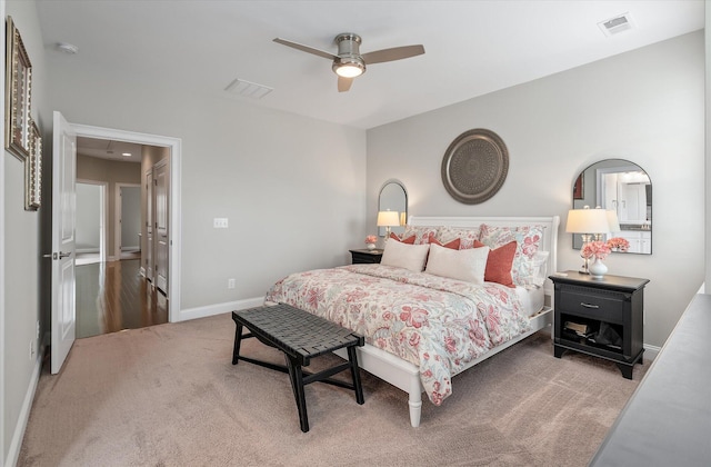 bedroom featuring ceiling fan, carpet, visible vents, and baseboards