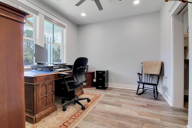 office featuring recessed lighting, baseboards, light wood-type flooring, and a ceiling fan