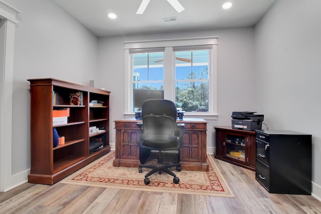 office space with visible vents, recessed lighting, light wood-style floors, baseboards, and ceiling fan