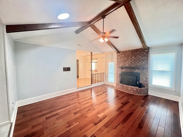 unfurnished living room with visible vents, baseboards, a ceiling fan, and wood finished floors