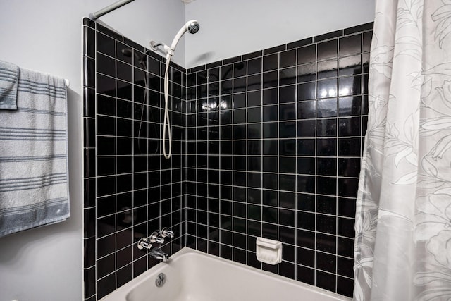 bathroom featuring shower / bath combination with curtain