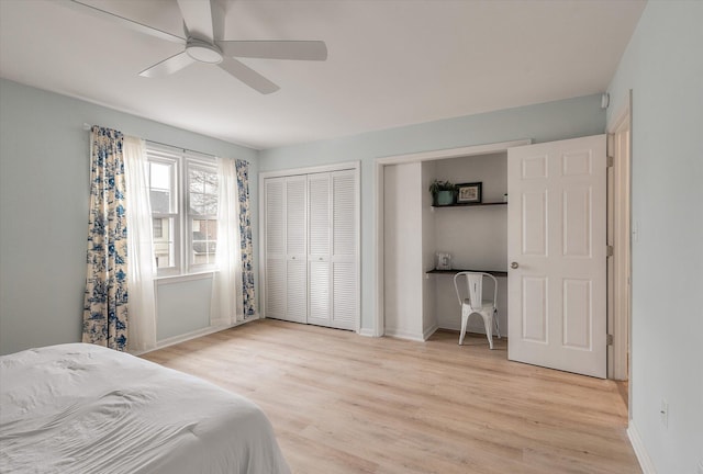 bedroom featuring light wood-style flooring, baseboards, and ceiling fan