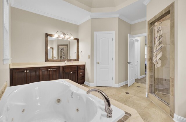 full bath with a jetted tub, crown molding, a stall shower, vanity, and baseboards