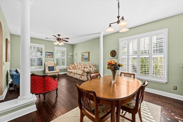 1330 Somersby Ln, Mount Pleasant, SC 29466 - dining space featuring ornate columns, baseboards, wood-type flooring, ceiling fan, and a textured ceiling