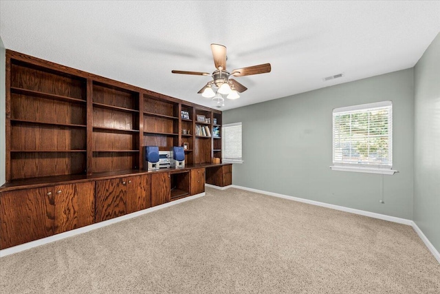 1330 Somersby Ln, Mount Pleasant, SC 29466 - unfurnished office with carpet flooring, baseboards, ceiling fan, and built in desk
