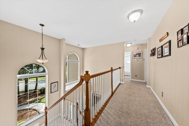 1330 Somersby Ln, Mount Pleasant, SC 29466 - hall with light carpet, baseboards, and an upstairs landing