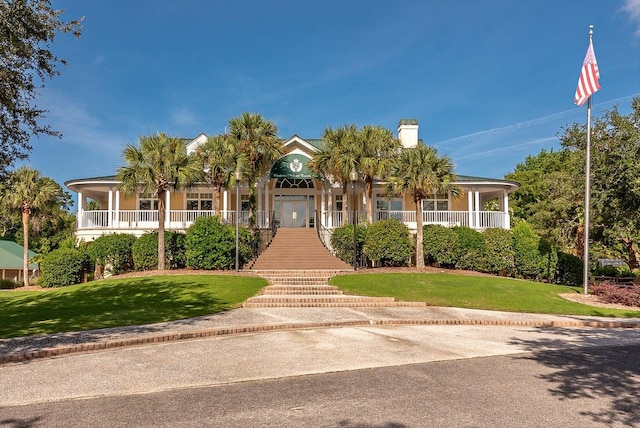1330 Somersby Ln, Mount Pleasant, SC 29466 - view of front facade with a front yard, a chimney, and covered porch