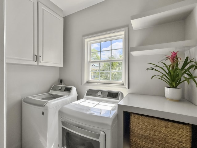 1491 Greenshade Way, Mount Pleasant, SC 29464 - laundry room featuring cabinet space and washing machine and clothes dryer