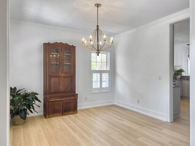 1491 Greenshade Way, Mount Pleasant, SC 29464 - dining room featuring light wood-style flooring, a chandelier, ornamental molding, and baseboards