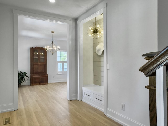 1491 Greenshade Way, Mount Pleasant, SC 29464 - mudroom featuring a chandelier, light wood finished floors, and baseboards