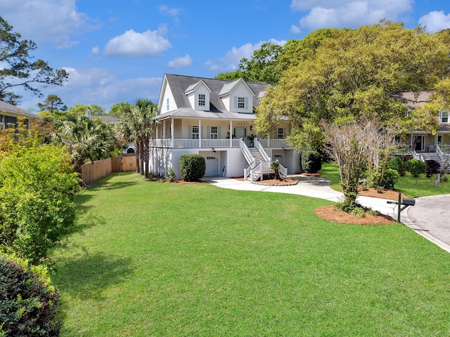 1491 Greenshade Way, Mount Pleasant, SC 29464 - view of front of house with stairs, driveway, a porch, and an attached garage