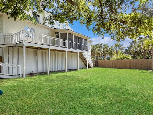 1491 Greenshade Way, Mount Pleasant, SC 29464 - back of property featuring a sunroom, stairs, and a wooden deck