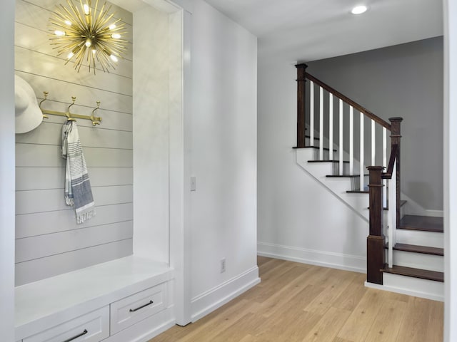 1491 Greenshade Way, Mount Pleasant, SC 29464 - stairs with a chandelier, wood finished floors, baseboards, and recessed lighting