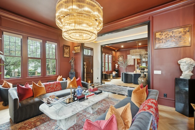 living room with ornamental molding and a notable chandelier