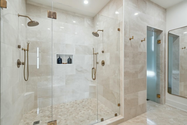 full bathroom with a shower stall