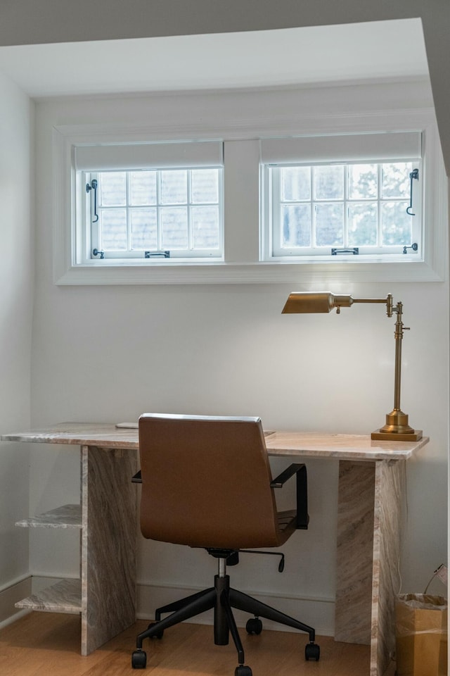 office space with wood finished floors