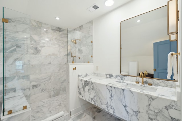 bathroom with recessed lighting, marble finish floor, visible vents, and a walk in shower