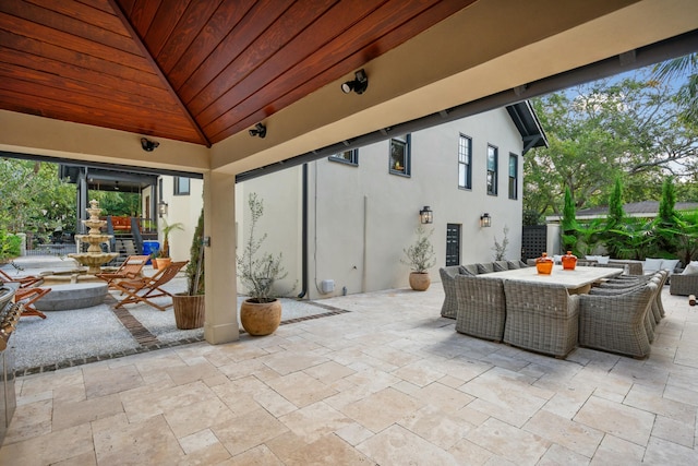 view of patio with outdoor dining area and an outdoor living space