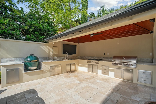 view of patio / terrace with a sink and area for grilling