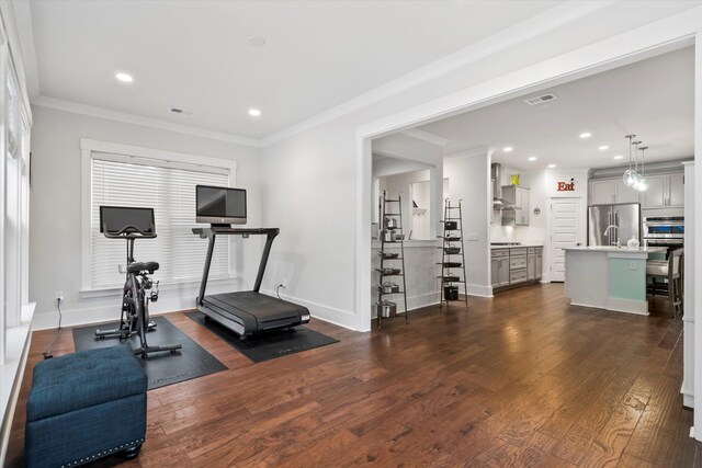 2331 Brinkley Rd, Johns Island, SC 29455 - exercise area featuring dark wood-type flooring, recessed lighting, and ornamental molding