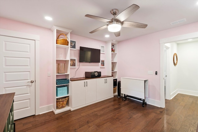 2331 Brinkley Rd, Johns Island, SC 29455 - unfurnished living room featuring a ceiling fan, dark wood-style flooring, and recessed lighting