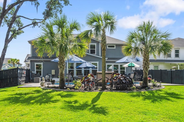 2331 Brinkley Rd, Johns Island, SC 29455 - rear view of property with a patio area and a swimming pool