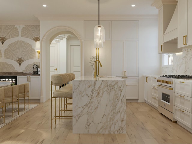 8 Homel Pl, Charleston, SC 29403 - kitchen featuring white range with gas cooktop, backsplash, crown molding, light stone countertops, and a sink