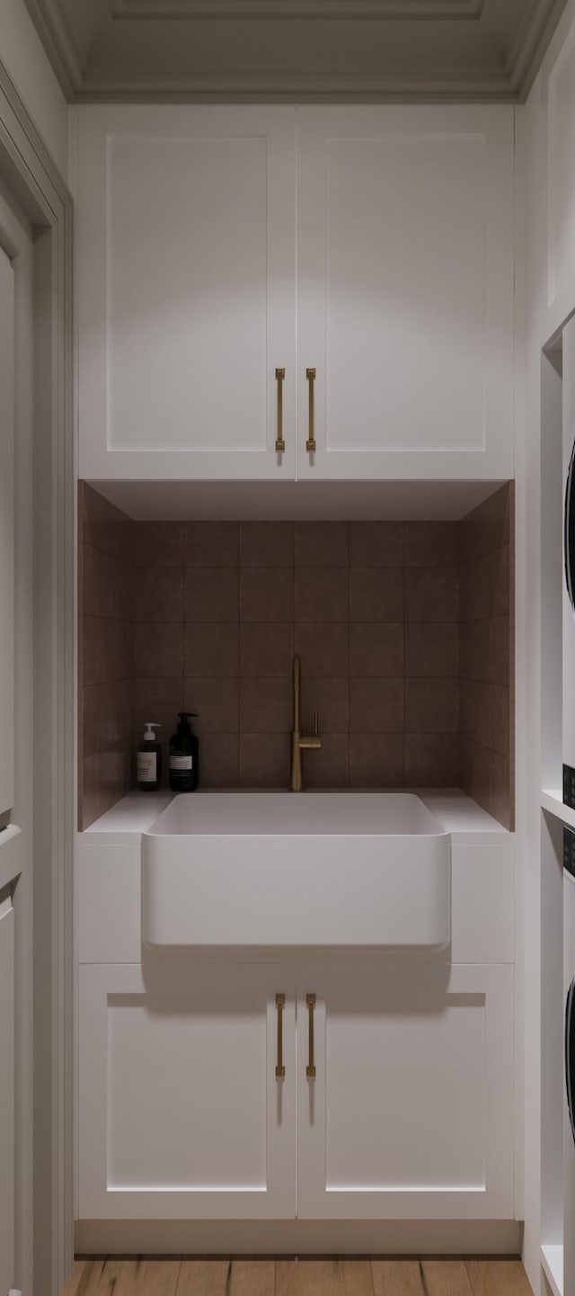 8 Homel Pl, Charleston, SC 29403 - interior space featuring laundry area, stacked washer and dryer, and a sink