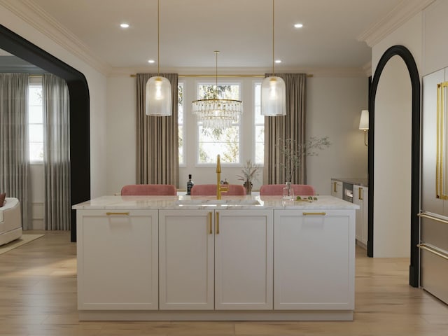 8 Homel Pl, Charleston, SC 29403 - kitchen featuring crown molding, light stone counters, a sink, and recessed lighting