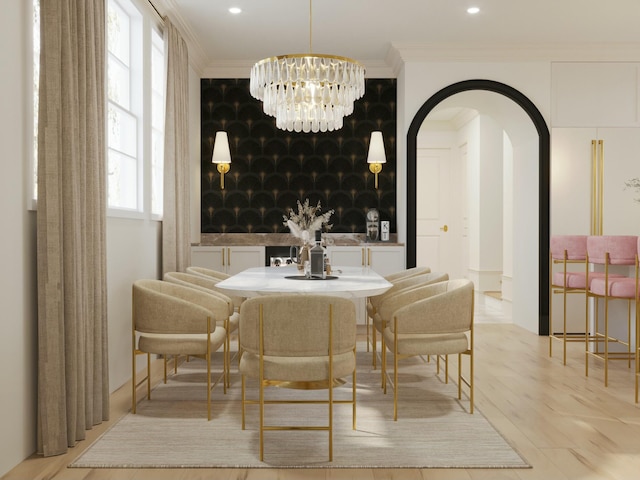 8 Homel Pl, Charleston, SC 29403 - dining area with arched walkways, an inviting chandelier, ornamental molding, and recessed lighting