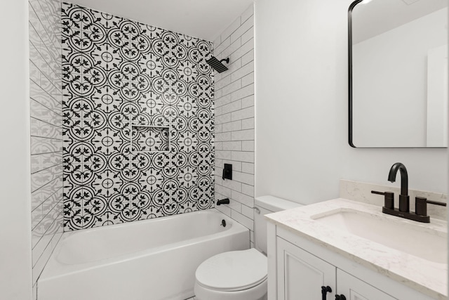 full bathroom with tiled shower / bath combo, vanity, and toilet