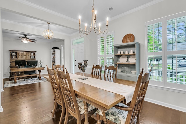 2467 Bergeron Way, Mount Pleasant, SC 29466 - dining area featuring a chandelier, plenty of natural light, dark wood finished floors, a ceiling fan, and crown molding