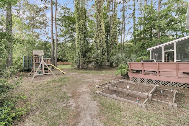2467 Bergeron Way, Mount Pleasant, SC 29466 - view of yard with a playground, a vegetable garden, a sunroom, and a deck