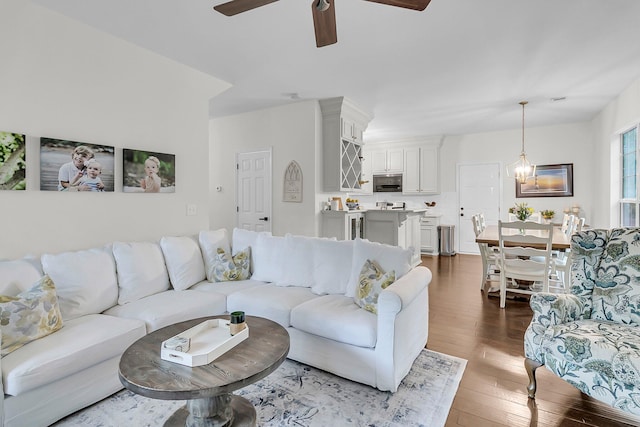 2467 Bergeron Way, Mount Pleasant, SC 29466 - living room featuring a ceiling fan, dark wood-style floors, and a chandelier