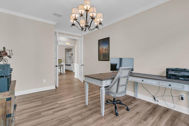 home office featuring arched walkways, visible vents, crown molding, and wood finished floors