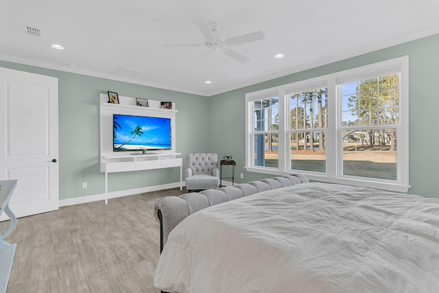 bedroom featuring baseboards, recessed lighting, wood finished floors, and ornamental molding